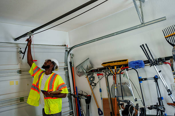 Professional Garage Door Installation technician working in Kaysville, UT